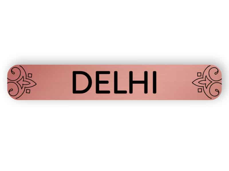 Delhi - rose guld märke